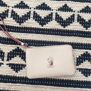 Never used Disney coach wristlet!